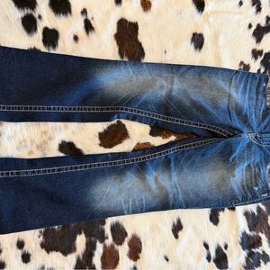 Silver brand Suki mid slim boot jeans.